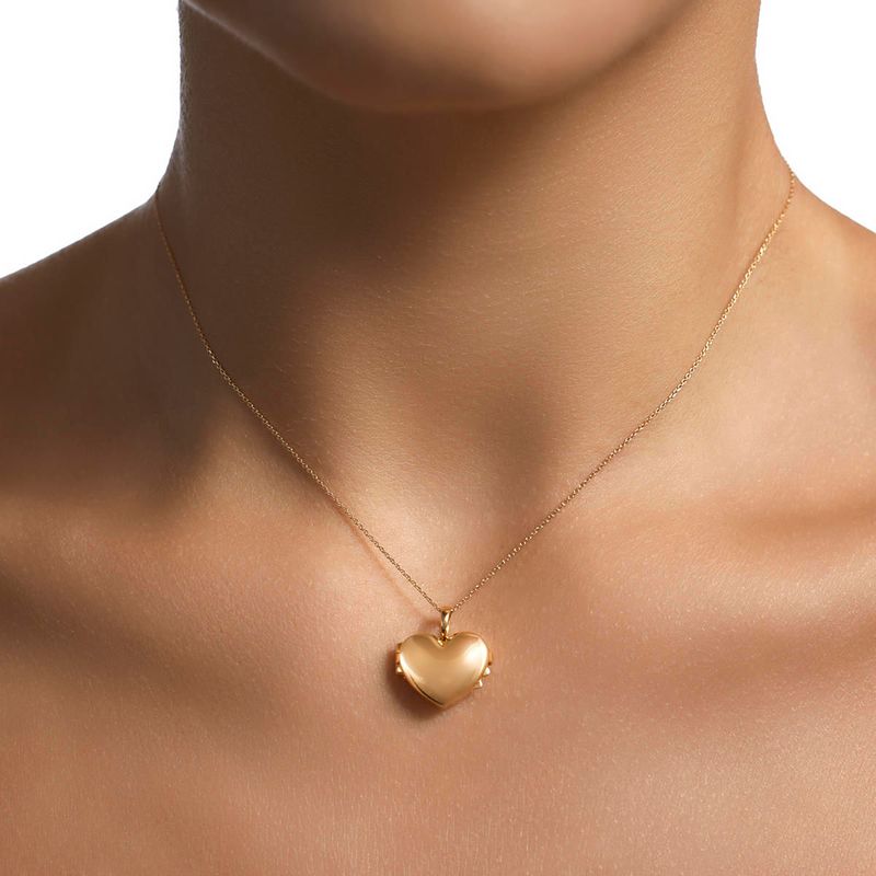 pingente-em-ouro-amarelo---relicario-coracao-079751-modelo-01